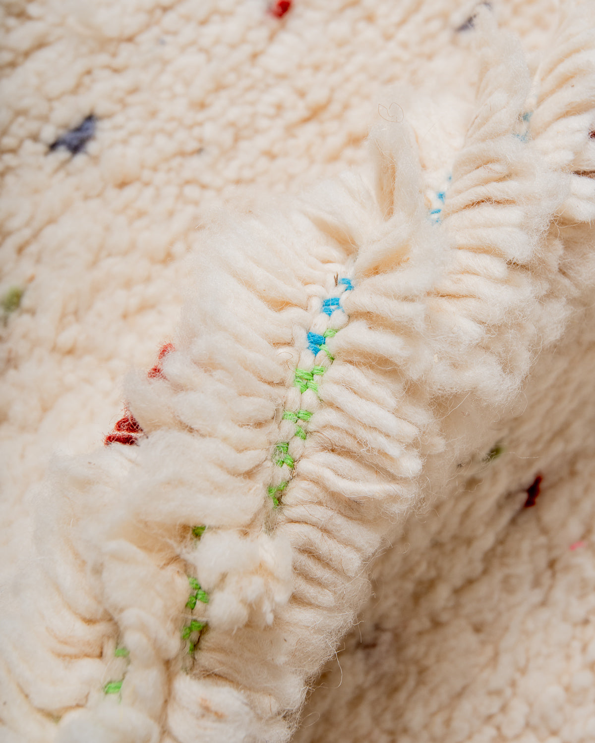Modern, designer, handcrafted Berber rug from Morocco. Beniourain carpet with beautiful colours and patterns and fluffy wool texture.